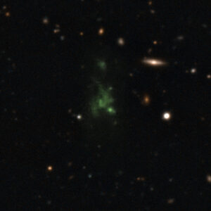 Green glowing Lyman alpha blob LAB-1 surrounded by faint distant galaxies