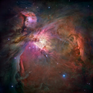 Hubble mosaic of the Orion Nebula showing glowing gas, dark dust and thousands of young stars