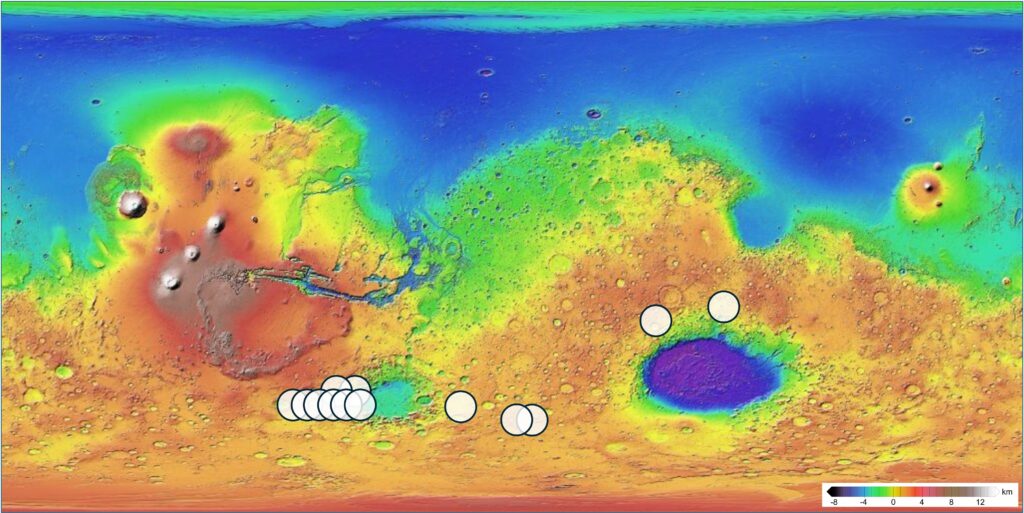 Topographic map of Mars with 13 candidate source regions for the Teghaza 001 meteorite marked