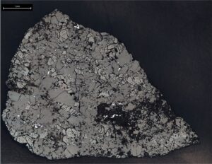 Microscope image of a polished slice of the Teghaza 001 Martian meteorite showing its mineral grains
